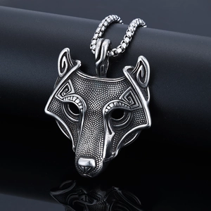 Viking wolf head pendant necklace in vintage silver with detailed metal carving
