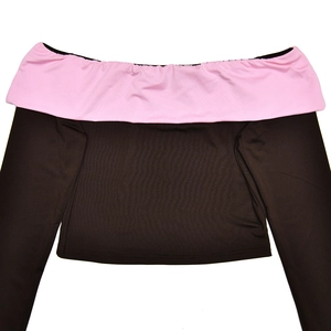 Detail of off-shoulder long sleeve top with pink contrast fold and black knit fabric