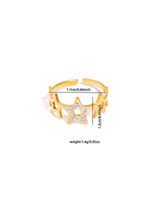 Detail shot of gold hollow star ring with cubic zirconia inlay and adjustable band size
