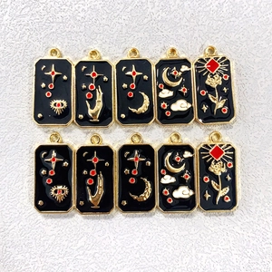 Star and Moon Tarot alloy pendants in black and gold for DIY jewelry making