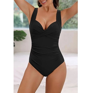 Detail of black one-piece swimsuit featuring deep V-neck and ruched waist design