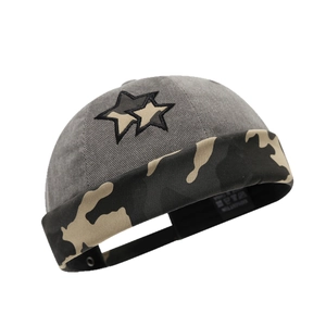 Retro camo brimless miki hat in grey knit with embroidered stars and contrast folded cuff