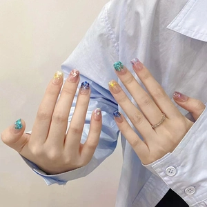 Sparkly mermaid gradient press-on nails with colorful sequins in a short square shape