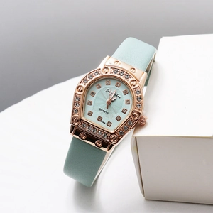 Elegant rose gold horseshoe watch with mint green dial and crystal accents for women