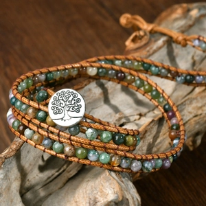 Detailed close-up of handmade Indian agate beaded bracelet with Tree of Life silver clasp