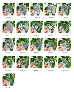Collage of 21 decorative rainbow suncatcher stickers with celestial and botanical designs