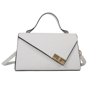 White crocodile pattern shoulder bag with golden twist lock and geometric flap design