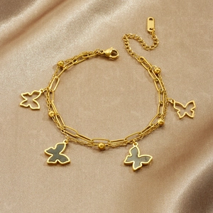 Elegant gold-plated double-layer stainless steel bracelet with black butterfly pendants
