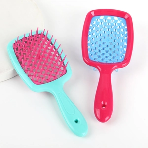 Hollow honeycomb massage hair brush set in pink and cyan for wet and dry hair use
