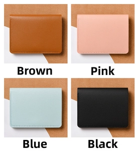 Short leather wallets in brown, pink, blue, and black with荔枝 texture and neat stitching