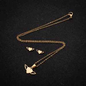 Golden stainless steel jewelry set featuring winged heart pendant necklace and stud earrings