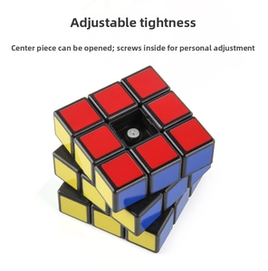 Detail view of the 3x3 speed cube showing its adjustable tension screw and internal mechanism