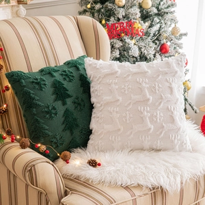 Christmas pillow covers with 3D snowflake and tree embroidery on a cozy sofa