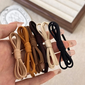 Set of six woven elastic bow hair ties in beige, brown, and black, high-quality hair accessories