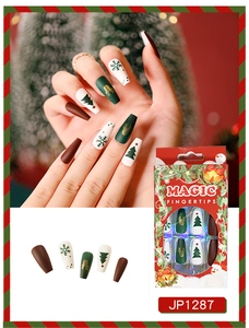 Christmas press on nails with brown reindeer and green tree designs in coffin shape