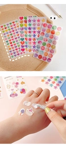 Detail of colorful washi stickers with heart and star patterns for scrapbooking