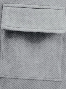 Detail of grey heavy jacquard jacket featuring cargo pocket and twill fabric texture