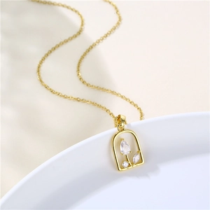Elegant gold stainless steel necklace with marquise-cut zircon flower inside a frame