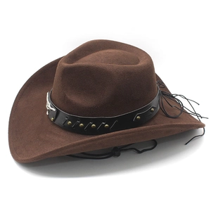 Detail of faux suede cowboy hat with black leather band and silver bull head emblem