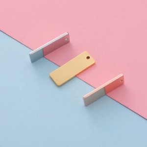 Polished stainless steel rectangular pendants in silver, gold, and rose gold finish