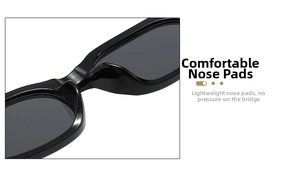 Detail of integrated nose pads on black oval sunglasses for lightweight comfort