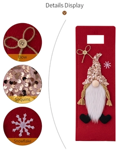 Detailed close-up of Gnome wine bottle bag with sequined hat, bow, and snowflake applique