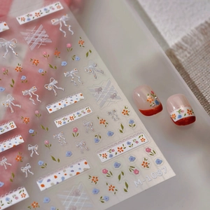 Floral nail art stickers with white 3D bows and lace patterns in model M-1087