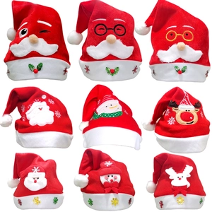 Various lighted red non-woven Christmas hats featuring cartoon Santa, snowmen and reindeers