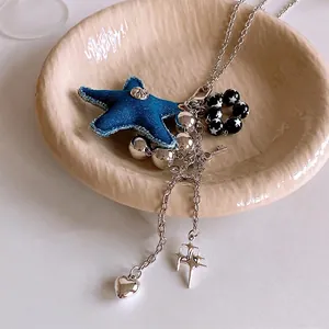 Collier en acier titane avec perles d'étoiles, étoile de mer en denim bleu et breloque clé
