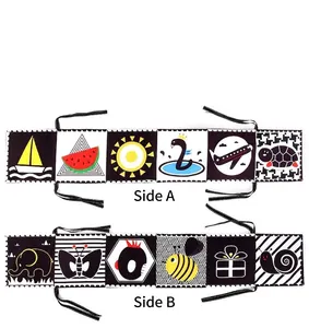 Double-sided high contrast black and white infant bed bumper book with patterns