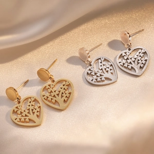 Golden and silver tree of life heart earrings in cutout stainless steel design