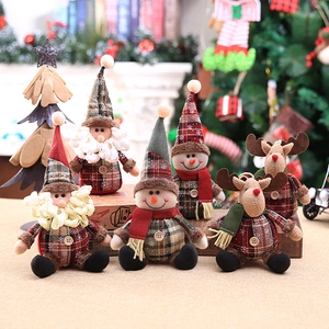 Christmas tree ornaments set featuring plaid fabric Santa, snowman, and reindeer dolls