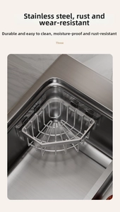 Detailed view of stainless steel corner sink caddy with grid drain design and adhesive hooks