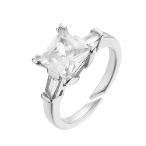 Close-up of adjustable silver ring featuring princess-cut cubic zirconia stones