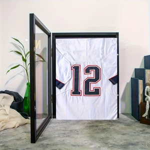 Black shadow box frame for mini jersey display with magnetic door and internal hanger