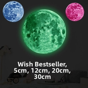 Luminous moon wall stickers set in 5cm to 30cm sizes glowing in green blue and pink