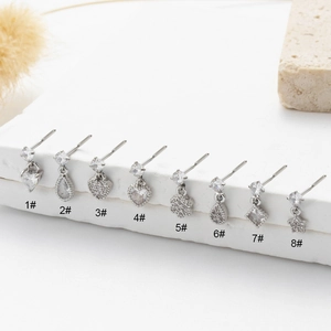 Set of 8 stainless steel nose studs with sparkling zircon pendants in various shapes