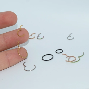 Set of 20G 316L stainless steel hinged segment rings in gold, silver, and rose gold colors