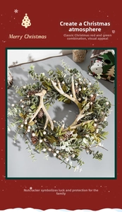 Macro detail of Christmas wreath with pine cones, white berries and beige antlers