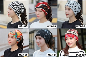 Close-up of multi-functional neck gaiters in various zebra and geometric patterns