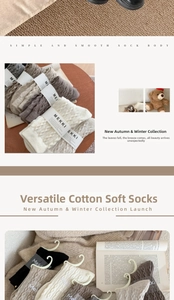 Close-up of thick cable knit texture on soft autumn winter crew socks in neutral tones