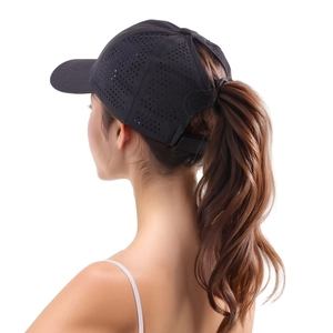 Detail of black quick-dry baseball cap featuring ponytail hole and breathable mesh holes