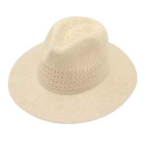 Classic cream straw Panama hat with wide brim and dented crown for summer sun protection