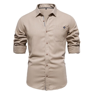 Detailed macro view of the lapel collar and texture of this khaki cotton men's shirt