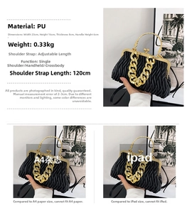 Detail view of black pleated PU leather handbag with gold chain and size measurements