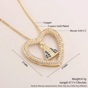Detail of 18k gold plated copper heart necklace with AAA CZ and blue saint icon