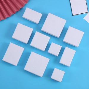 Minimalist white leather texture jewelry box collection on vibrant blue backdrop