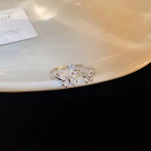 Elegant silver butterfly open ring with sparkling zircon stones in a stylish design