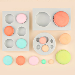 Silicone macaron molds for candles and baking with various sizes and colorful finished crafts