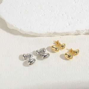 Geometric square woven gold and silver earrings in a set with polished metallic finish